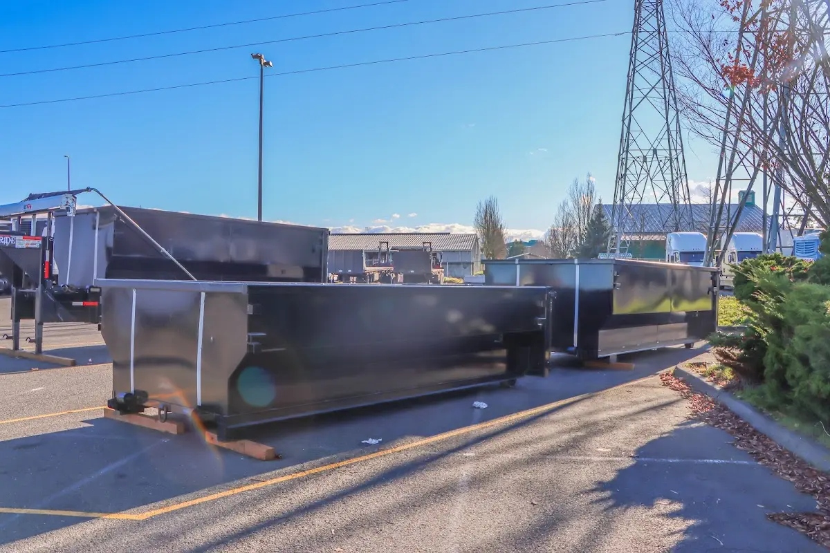 Roll-off dumpster ready for waste disposal at job site for 15 Yard Dumpster Rental in Pierre
